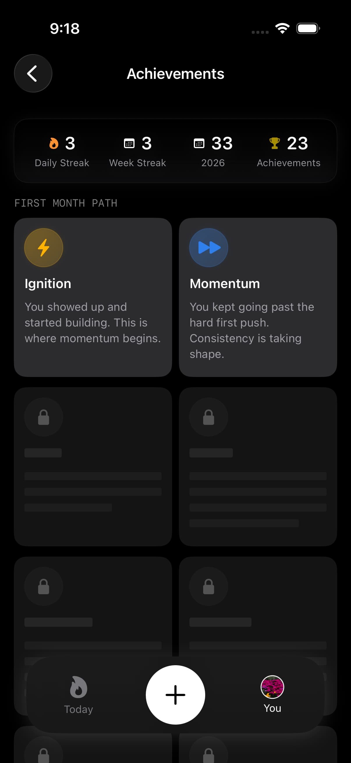 Achievements screen showing streak and badge progress cards